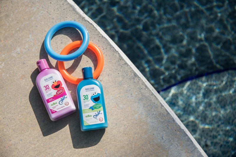 photo of Blue Lizard sunscreen laying by a pool