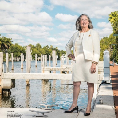 portrait photography of Teresa Weintraub standing on a dock